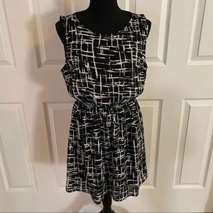 Forever 21 open back black and white above knee dress.